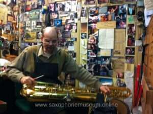 photo of the saxophone being repaired