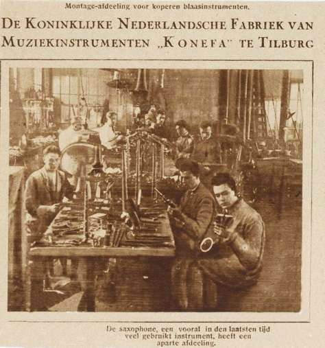 A newspaper clipping with a photograph showcasing the saxophone part of the factory.